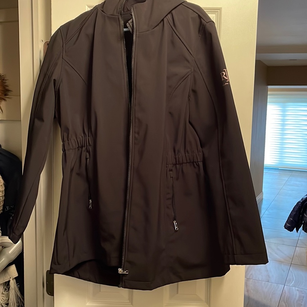 Ralph Lauren rain jacket with soft lining inside. Gathered at the waist